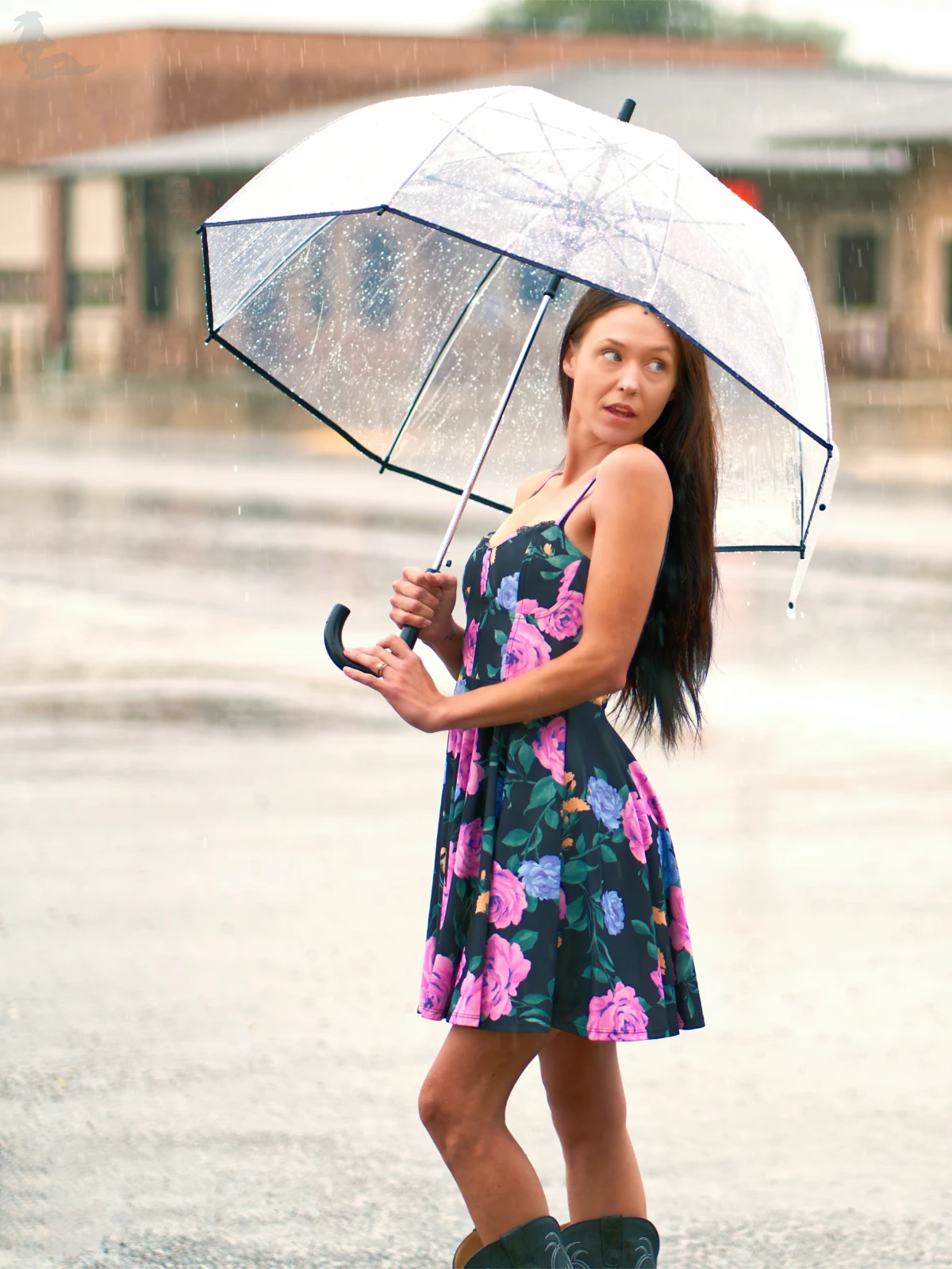 Model Bonnie posing outdoors in the rain at a professional glamour shoot
