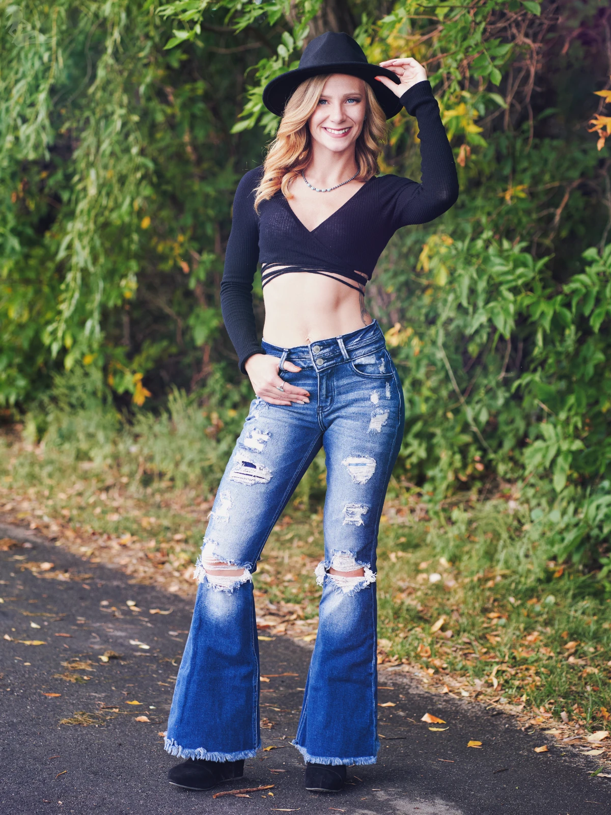 Model Chelsie posing outdoors at a professional glamour photography shoot