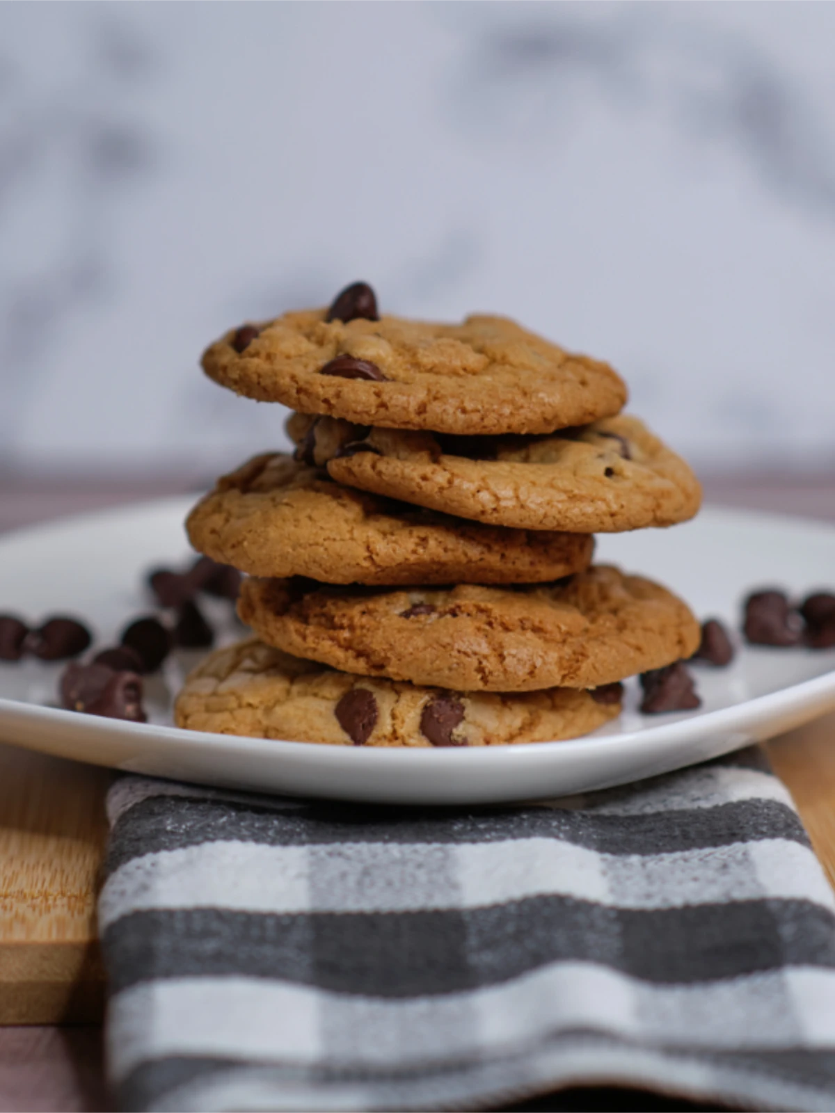 Plate of stacked chocolate chip cookies