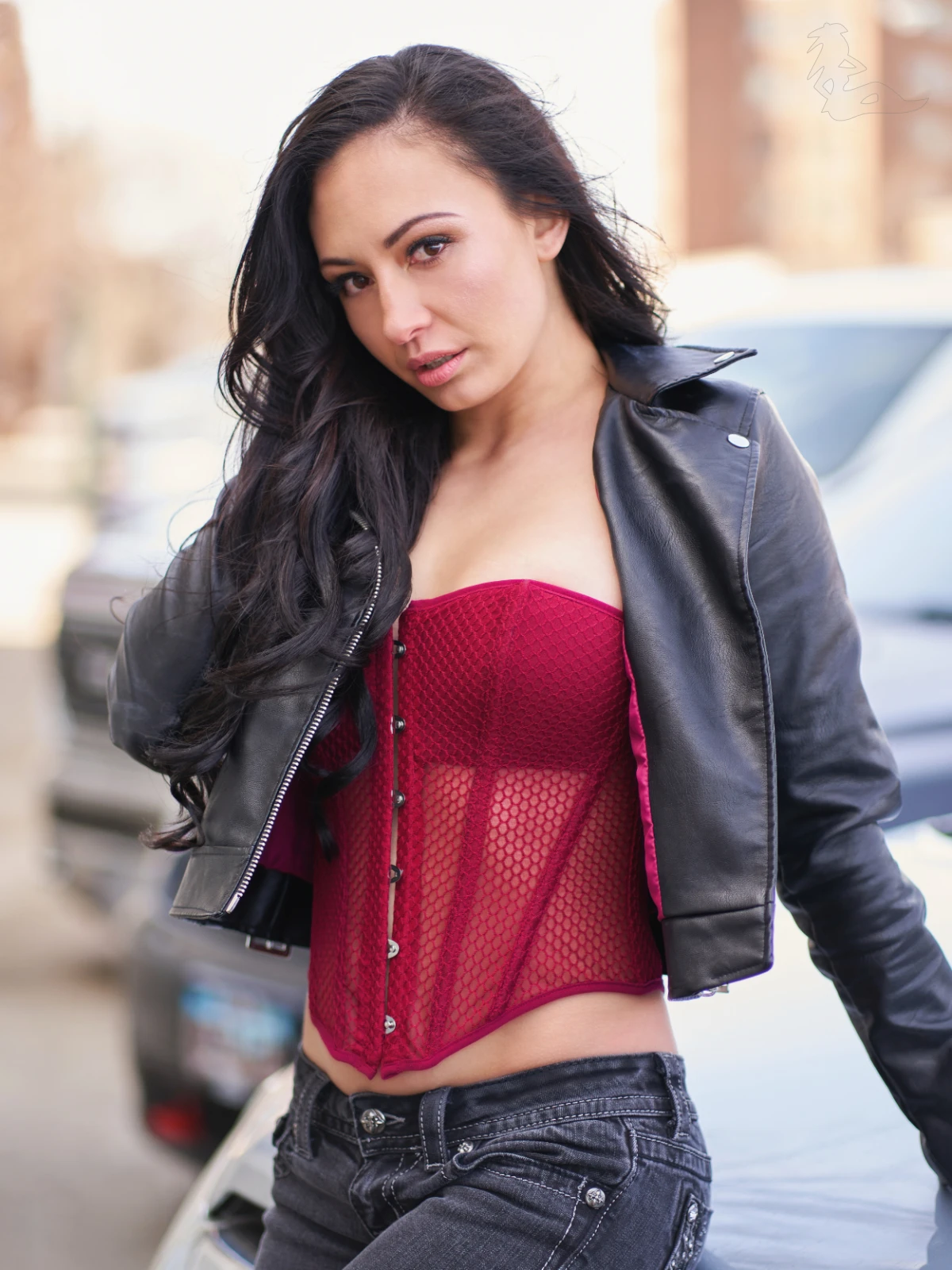 Model Sarah posing outdoors at a professional glamour shoot